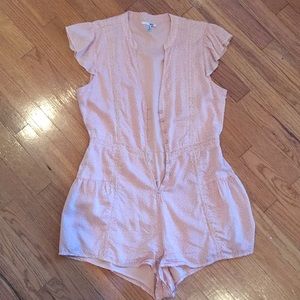 Light pink romper.